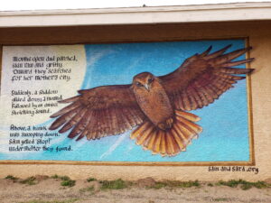 Mural of Eagle Mural on Visitor Center Wall with text from Sam and Sara book.